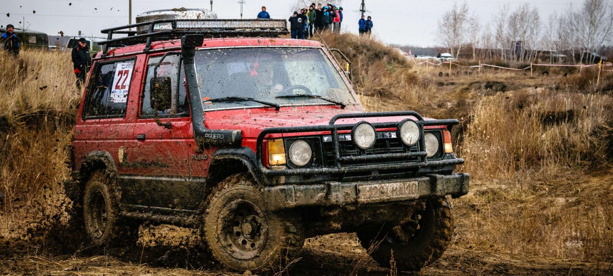 Red Mitsubishi 4x4 by Nikita Volodko